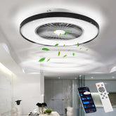 Ceiling fan with light fixture in a modern room setting, featuring a smartphone and remote controls.